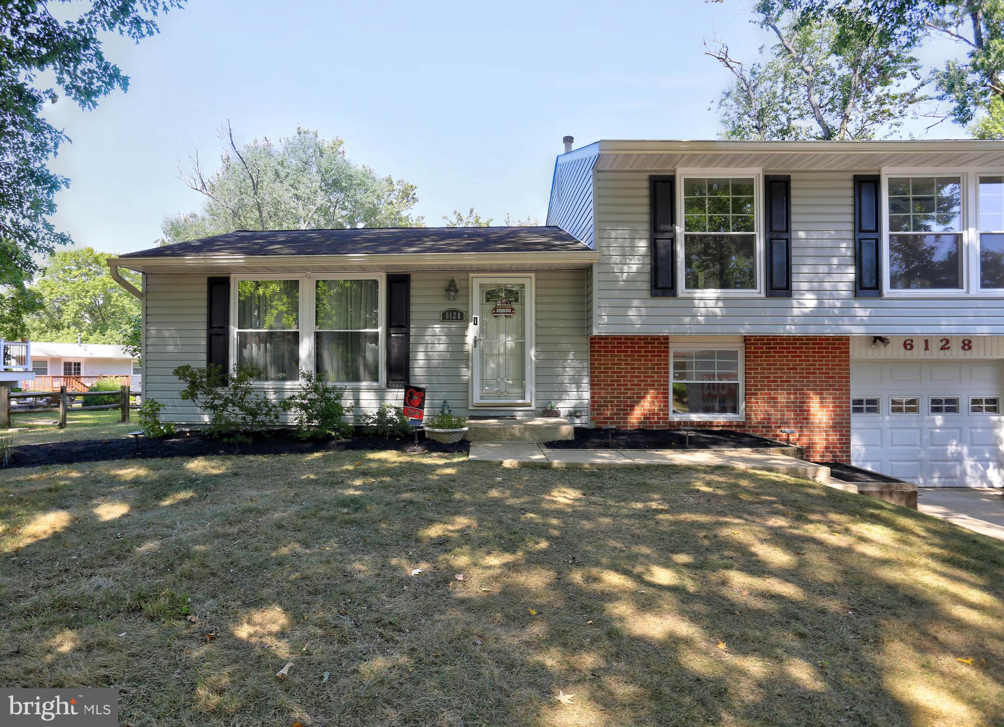 Beautifully updated 3 BR, 2.5 BA Stevens Forest home with amazing indoor & outdoor entertaining space! The kitchen features quartz countertops, new tile backsplash, stainless appliances (new fridge & dishwasher), island cooktop & breakfast bar. Off the kitchen is an extended family room that opens to a large deck with stairs leading to the fenced yard & tiki bar. Main level offers a formal living & dining room plus a half bath. Upstairs, 3 spacious bedrooms & 2 full baths. Lower level includes a finished game room with garage & patio access, plus laundry, storage & flex space. 1-car garage + driveway, fenced yard, & great flow for entertaining.
