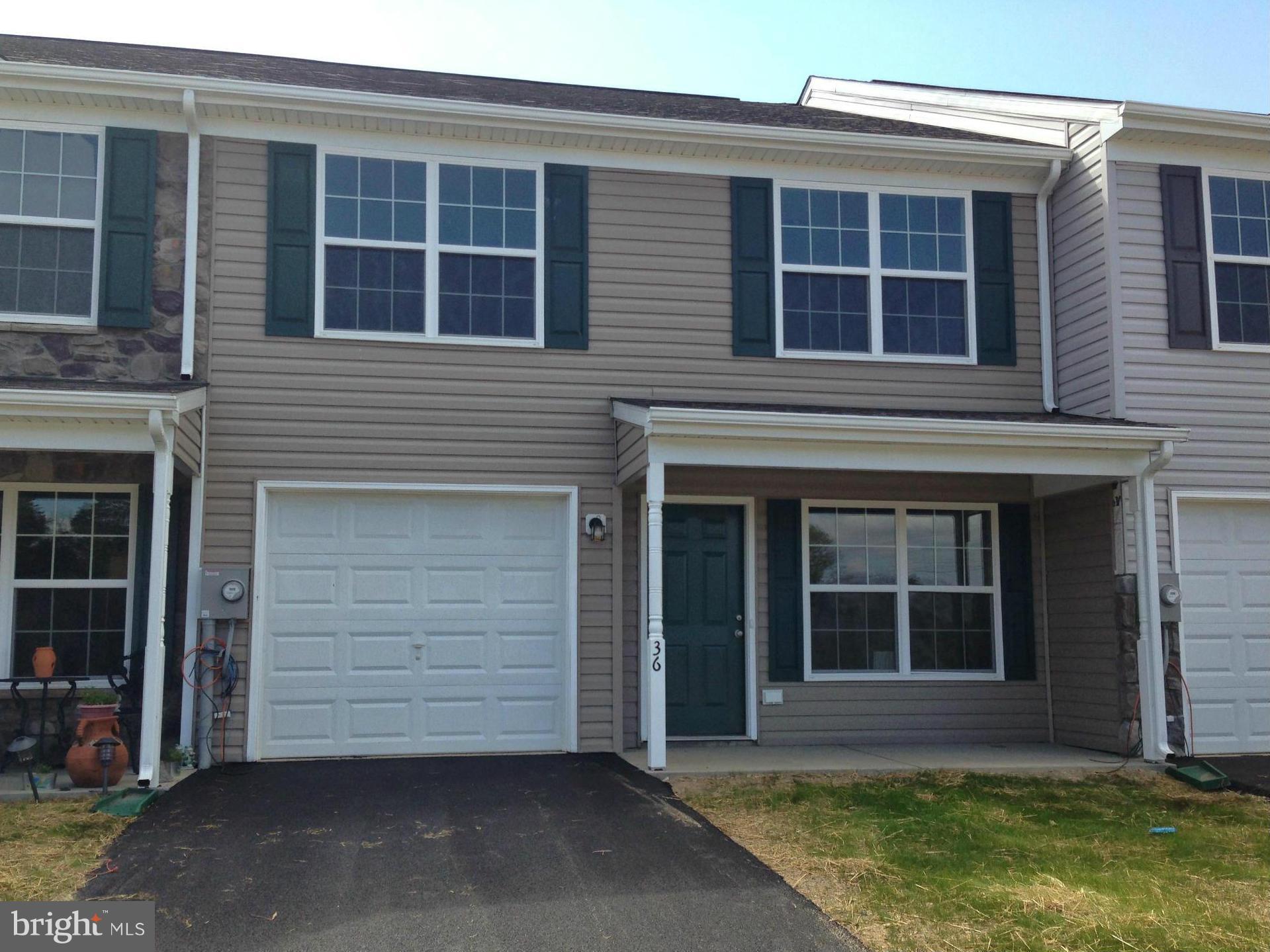 60 Day Delivery! 22 foot wide garage TH w/close to 1850 sq.ft. on 2 levels. 3BR, 2.5BA, 1-car garage , Moen faucets, GE appliance package, tile flooring, vinyl windows, one year warranty. Photos may show combinations of both 3 or 4 bedroom layouts, and kitchen cabinet/countertop color choices. Email for more information. Floor plans, standard features, and specs are in Matrix documents.