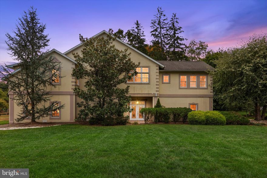 This exciting, unique custom built contemporary home located in scenic Washington Crossing was completely redone in 2005.   Situated on a manicured half-acre backing to historic Washington Crossing Park.   Stamped concrete walkway leads to a covered entry featuring double leaded glass doors to an expansive formal foyer/meeting room/entertainment room/dining area/home office   whatever you want it to be.  Stone walls, massive glass doors to covered rear patio and private grounds.  Back inside is another finished room and bath.  Could be a guest room, an office, den...  Also, entry to an oversized 2 car garage.  Up the turned staircase to dramatic open living space   Gourmet Kitchen, Island, Great Room with vaulted ceiling, recessed lights, full wall of doors leading to a second floor deck with awnings which run the length of the house.  Back inside is a cozy den or dining room with fireplace flanked with bookcases on both sides.  There is a powder room and utility room on one side and the opposite side of the house has 3 bedrooms, one of which is an awesome Main Bedroom with Walk-In Closet and Private Bath.  The bedroom has glass doors leading to the second floor deck. Wow!  Wow!  Wow!  This home has so much to offer