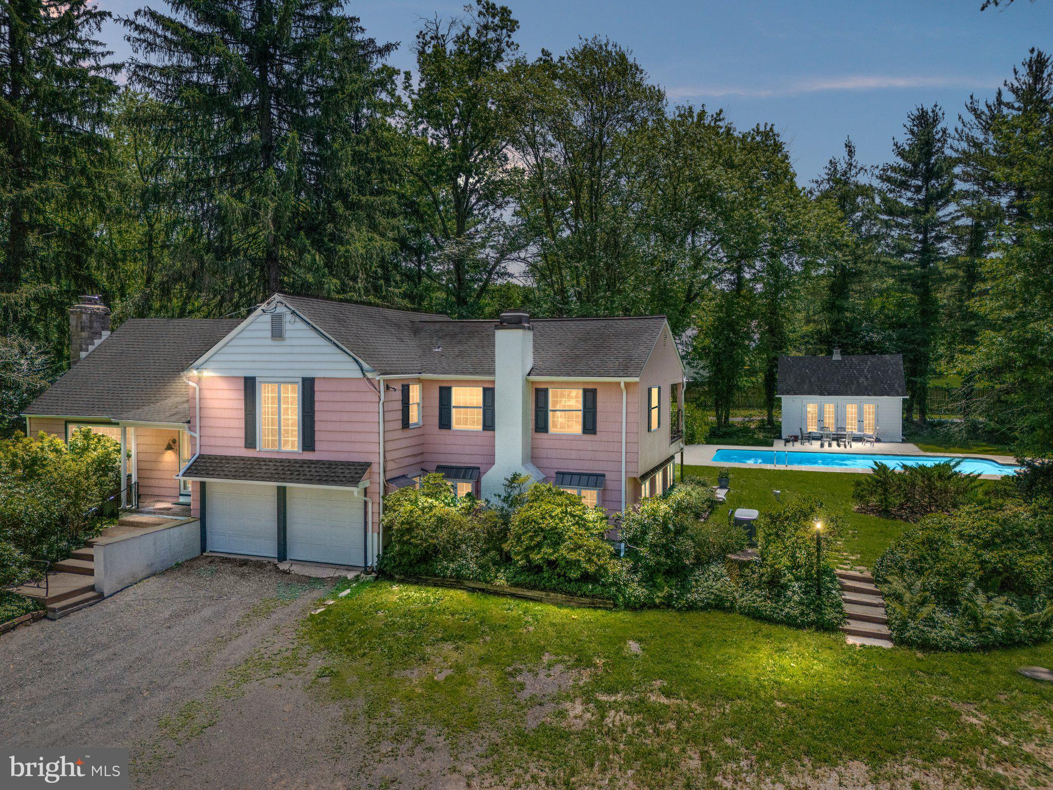 The charm of a country home with the setting of a magical outdoor space is combined in this rare offering on Windy Bush Road. Throughout this sprawling home, you will find custom built-in storage, beams and nooks and places to sit and read, think and relax. If entertaining is more on your mind, then you have found your dream space! Outdoor spaces include a small and delightful pond, charming gardens, inground pool and pool house and covered and open outdoor spaces with access to the yard and pool. The interior of this unique home offers large and spacious entertaining rooms, a kitchen that allows the cook to be be part of the party and a large solarium hallway that brings you to the huge great room with custom shelves and fireplace as well as the vine covered sitting area overlooking the yard and pool. A full bath and laundry are conveniently located on this level which also leads to the two car garage and partial basement a few steps away. The kitchen offers large prep areas, a farmhouse sink plus a prep/bar sink and access to the dining room, solarium hallway and the deck right off the breakfast area. A separate sunroom is located near the dining room and features lovely green views of the side yard and offers a respite for quiet reading or contemplation. Heading to the upstairs for the night brings you to an amazing primary bedroom with it's own private outdoor sitting area overlooking the rear yard. The huge walk in closet and builtins assure you will never need more storage space. An updated primary bath with lots of counter area and a walk in shower also creates a sense of peace, space and privacy as you end or start your day. Bedrooms two and three are very generous in size and also offer built in drawers and storage spaces. Bedroom three can serve as a home office or private guest space with a huge desk or storage area and views of the backyard. There are so many improvements to this rare and distinctive home and the quality of the updates show the dedication of the owners to making this home one of great harmony. The septic system was replaced in 2016, a whole house propane generator keeps your new home trouble free and always bright and comfortable. Other recent improvements include a new roof on the pool house, new gutters on the main home and renovations that include flooring, kitchen, laundry and lower bath, updates to HVAC and a lifetime guarantee on the recent removal of bamboo from the front of the home. A one year home warranty is included to allow for peace of mind. With a location offering convenience to New Hope, Doylestown and Newtown, along with access to commuting routes and shopping, this sheltered home allows you to enjoy a country lifestyle while still providing access to all that the Bucks County area offers. Highly rated Council Rock Schools offer the best in educational value. You can make this your home quickly. While the owners have maintained this home and have full details on recent improvements, this home is offered in "as is" condition. Come to see and stay a while. This home offers something for everyone.