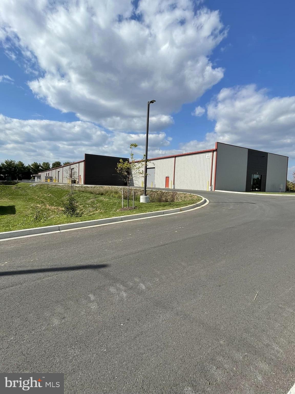 PRICE ESTIMATE for Cold Dark Shell - 331 Aviation Way is a Sprinklered Condominium Building with PRICE ESTIMATE for Cold Dark Shell - 331 Aviation Way is a Condominium Building with 55,002 SF.           Unit 3 (5,652 SF); Unit 4 (5,172 SF), Unit 5 (5,781 SF), Unit 6 (5,652 SF), are Available for Sale (Price Neg.) or Lease (at $14 SF).  
The Site totals 4.66 Acres and is Zoned M1 (Light Industrial) and located in the (AO) Airport Overlay Zone.  Located Across from Frederick Airport.