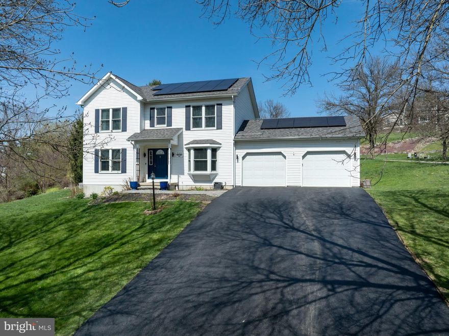 OPEN HOUSE - Sunday, May 17th, from 1:00-2:30pm. Upgrades abound at 211 Baldwin Street, a beautifully improved 4‑bed, 2.5‑bath home set on a .37‑acre corner lot in Lemont’s desirable Nittany Orchard neighborhood. Perched on a gentle rise, the home carries an elevated presence and lovely views of Mount Nittany, all while being just minutes from shopping, entertainment, and everything Penn State. Inside, a bright two‑story foyer introduces the inviting layout, flanked by a flexible living space or office and a formal dining room with a charming bay window on the other. The living room offers a warm gathering space with a gas fireplace, wood mantel, and built-ins with integrated lighting. The adjacent kitchen—refreshed in 2026 with quartz countertops—features LVP flooring, tile backsplash, stainless‑steel appliances, and stylish cabinetry. A convenient walk‑in pantry sits just beyond the kitchen, and glass sliders lead to the back deck for easy indoor‑outdoor living. Every bathroom in the home was thoughtfully updated in 2023, complementing a long list of meaningful improvements including all new Renewal by Andersen windows and back door, a newer roof with paid‑off solar panels, a hybrid water heater, a Culligan water softener, refreshed electrical with new outlets and recessed lighting, and crown molding. Upstairs, the expansive primary suite impresses with a beautifully updated ensuite bath featuring a dual‑sink vanity, tile floors, glass shower, soaking tub, and a large walk‑in closet accessed through the bath. Two additional bedrooms, an updated full bath, and a second‑floor laundry closet complete the level. The mostly finished lower level adds a fourth bedroom, a spacious rec room with bar, and dedicated areas for storage and workshop needs. Outside, the extended and repaved driveway enhances curb appeal, and the fenced garden with raised beds is perfect for home growers or flower enthusiasts. With its extensive upgrades, flexible living spaces, and a location that truly shines, this home checks all the boxes and is one you won’t want to miss! See it today!