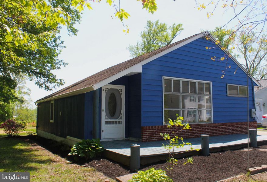 ***Updated price***Welcome to this beautifully updated home in this water-oriented neighborhood. This home has everything you need and more!  3 bedrooms and 1 1/2 bath.  This beautiful kitchen has plenty of storage with granite countertops, classic back splash and stainless-steel appliances.  Each of the 3 bedrooms has spacious closets. There are pull-down attic stairs for out of season decor.  The 2-car garage has a separate entrance and can be used as an extra living space or a traditional garage.  There is also a shed in the back of the property for all of your outdoor items.  The marina two doors down hosts Charley's waterfront, a hangout for the area locals.  This property has so much to offer!  Schedule your showing today!

Garage is being sold as is as.  The pellet stove in the garage is being sold as is.