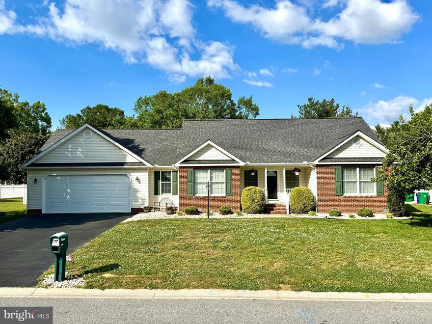 Beautifully maintained 3-bedroom, 2-bath home built in 2005, offering comfortable living and a thoughtfully designed layout. A standout feature of the home is the oversized living room, providing an impressive amount of space for relaxing, entertaining, or hosting gatherings.  The kitchen offers generous cabinetry along with a large pantry for excellent storage and organization. A separate laundry room adds everyday convenience. Step outside to enjoy the fully fenced backyard featuring both a deck and patio, creating the perfect setting for outdoor dining, entertaining, or quiet evenings at home.  Additional highlights include a two-car garage with a newly installed garage door and a brand new roof installed just prior to listing.  This well cared for home is move-in ready with spacious living areas and great outdoor space - this one is a must see!