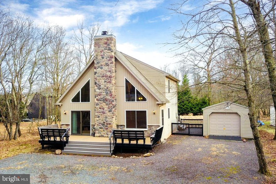 Welcome to 57 Bishop Circle. A beautiful three-bedroom, two and one-half bath home, nestled in the highly sought-after community of Towamensing Trails. This spacious home offers the perfect blend of comfort and convenience, ideal for those seeking a peaceful retreat while still enjoying access to a variety of community amenities. Step inside to discover an open and airy floor plan, featuring a cozy living room with a pellet stove and exposed wood beams that sets the tone for relaxing evenings at home. The fully equipped kitchen boasts stainless appliances, plenty of cabinet space, and a custom wood breakfast bar that opens to the dining area, making it perfect for entertaining guests. The first-floor master suite is a true retreat, with a private en-suite bath and ample closet space. Two additional generously sized bedrooms and a loft that overlooks the living room will provide plenty of room for family or guests. An additional half-bath adds convenience for visitors. Outside, enjoy the tranquility of the surrounding nature with two new spacious composite decks with built in seating areas, perfect for outdoor gatherings or relaxing in peace. The detached garage offers plenty of storage for all of your outdoor equipment. Whether you love boating, fishing, or hiking, Towamensing Trails has something for everyone, offering access to a private lake, beach, clubhouse, and walking trails, all just a short distance from your door. Don't miss out on this opportunity to own a lovely home in one of the most desirable communities in the area. Schedule a tour today!
Key Features
*Three bedrooms, two and one-half baths
*Bright and open living spaces
*Cozy pellet stove in the living room
*Spacious first floor master with en-suite bath
*Decks and outdoor space for entertaining
*Access to Towamensing Trails community amenities: private lake, beach, clubhouse, and more!
*Convenient location near local attractions, shops, and restaurants
Live the dream in Towamensing Trails – your perfect getaway awaits!