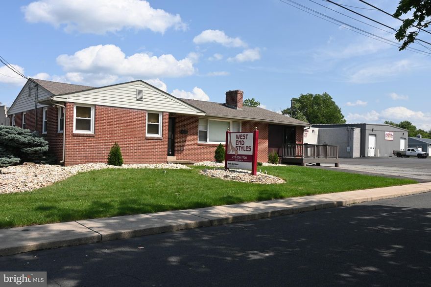 Calling investors and business folks. Property is zoned “neighborhood commercial” in Quakertown borough. So close to Route 309. Currently used as a salon/spa. According to records this property could be used as a daycare, nursery school, nursing home, medical office, bank, commercial services, health club etc. Call the borough with questions on zoning. The newer entry ramp is ADA compliant. Two powder rooms, brick fireplace sits in the middle of client workspace for ambiance. Ceiling fans and track lighting have been installed. Private covered back entrance is perfect for employees. Laundry facilities, private office area, newer central air conditioning unit, and building is heated with natural gas. The lower level is finished with a private walkout entrance. Parking for 22 cars on site and even on street parking is available. Included in the sale transfer is a lease for a nearby business of $500.00 per month for their parking use.
