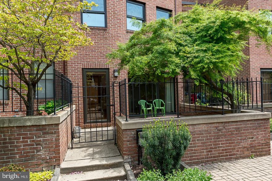 2 bedroom / 2 bath brick town home in gated community of Mt Vernon Mews.  Great layout for office or housemate. 2nd floor = large bedroom + full bath.  3rd floor = large bedroom + full bath & laundry.  ample storage.   updated kitchen & baths. large separate dining room. Hardwood on main floor.  enjoy your outdoor patio or check out the local restaurants & shops.  Just around the corner from Peabody & Walters. Transportation options available. close to Johns Hopkins / Baltimore Harbor.  I-83.  one reserved parking spot included.