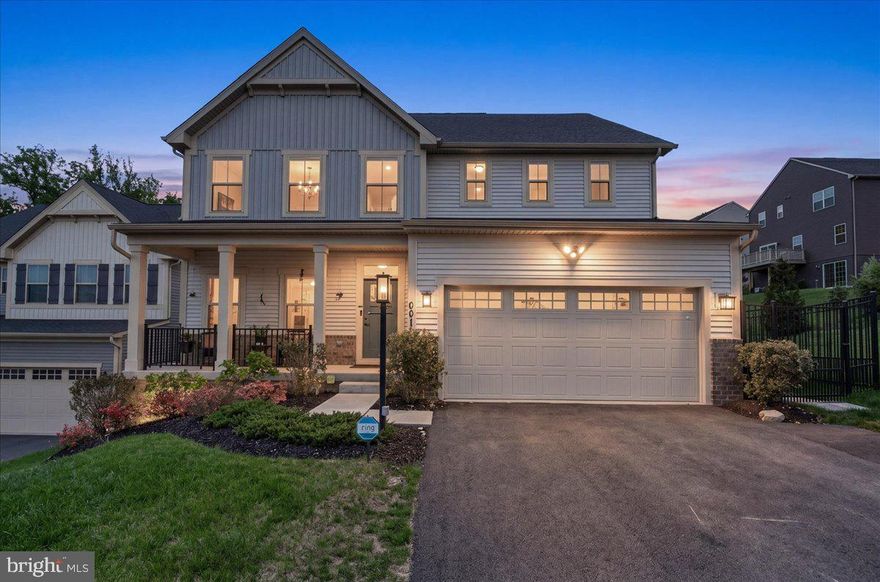 Nestled in the serene community of Lake Linganore, this exquisite Craftsman-style residence, offers a peaceful harmonious blend of luxury and comfort, perfect for those seeking an elevated lifestyle. Built in 2023, this stunning home spans over 4,460 square feet, and sits upon the largest lot in the Hamptons subdivision, showcasing meticulous craftsmanship and high-end finishes throughout. Step inside to discover an inviting open floor plan that seamlessly connects the gourmet kitchen, complete with an expansive island and upgraded countertops, to the family room. This space is designed for both entertaining and everyday living, featuring recessed lighting and elegant wood floors that exude warmth. The kitchen is equipped with top-of-the-line stainless steel appliances, including a gas oven/range, built-in microwave, and energy-efficient options, ensuring culinary excellence at every turn. The main level also boasts a luxurious primary suite, featuring two spacious custom walk-in closet and a large bathroom with a walk-in shower water closet. Additional bedrooms provide ample space for family members as well as guests. A second kitchen adds versatility for gatherings or culinary adventures. Venture outside to enjoy the beautifully landscaped lot, which backs to tranquil trees offering a peaceful retreat. The outdoor space features a deck with backyard access and patio, perfect for al fresco dining or simply soaking in the natural surroundings. The fully fenced backyard has a gate for direct access to the walking trail. The community amenities are unparalleled, with access to basketball courts, a dog park, walking trails, and a refreshing outdoor pool, all designed to enhance your lifestyle. This home also includes practical features such as a full basement with a walkout entrance, providing additional living space or storage, and an attached garage with ample parking. The property is equipped with modern conveniences, including a tankless water heater and front-loading laundry facilities, ensuring comfort and efficiency. With its prime location and luxurious features, this residence is more than just a home; it's a lifestyle choice that invites you to experience the best of Lake Linganore living. Embrace the tranquility, elegance, and community spirit that this exceptional property has to offer.