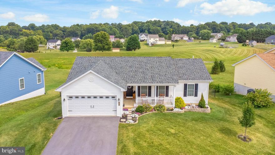 This meticulously maintained rancher, with easy access to commuting routes and nearby amenities, is an absolute must see! From the beautiful landscaping and covered porch in the front of the home to the relaxing deck and fire pit in the rear yard and all points in between, there is so much that this wonderful property has to offer to its new owners. Upon entry, you will discover an open floor plan, with a bright and welcoming living space, adorned with a modern fireplace and custom shiplap accent wall.  Offering plenty of natural light, the well appointed kitchen boasts brushed stainless steel GE appliances and ample counter space to make meal prep a breeze. Just off the eat in kitchen area is the rear deck, where you are sure to enjoy your views of the large fully fenced rear yard. Down the hall, you will find the primary bedroom and en suite bathroom, complete with a dual vanity, soaking tub, and separate shower. Two additional bedrooms, a second full bath and designated laundry room complete this main level, making one level living convenient, easy, and achievable. 

While the main level provides everything you may possibly NEED in your new home, the lower level provides the space of DREAMS. You have to see to believe what this full, mostly finished, walkout basement has to offer. With a stunning live edge bar and large finished recreational room, you can escape to your own private retreat. Adorned with beautiful barn doors, an additional full bath, and two unfinished storage areas round out the space. Currently used as a play area, there is an additional finished space that could be used as an office or to expand the current recreational area. Providing access to the rear yard via a walkout door, you can continue to entertain by the firepit where you and your guests can sit back, relax and enjoy all of the wonderful features of this fantastic property.