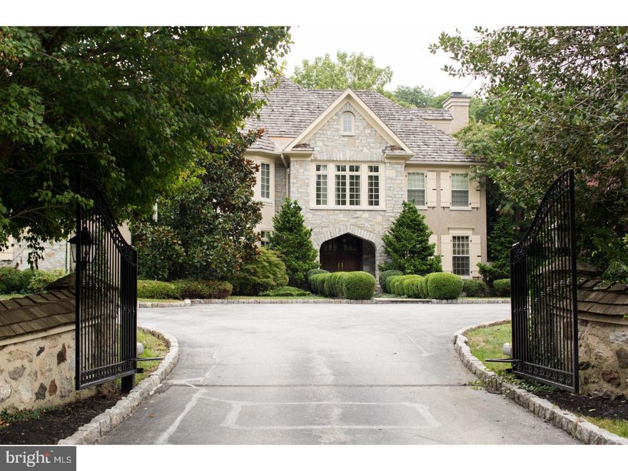 729 Harrison Road is a beautiful private stone manor home located off Parkes Run Lane in Villanova, Radnor Township.  This home was custom built by C.F Holloway Builders in 2004 and features beautiful architectural details throughout, 10 foot ceilings, custom millwork, coffered ceilings, a cherry paneled library and much more.  The first floor offers a two story foyer and formal living room and dining room, his and hers offices and a wide open family room area consisting of the large gourmet kitchen, sunken family room with floor to ceiling French doors with access to the rear patio and the most beautiful breakfast room which was just completed as an addition to home. The gourmet kitchen features custom inset door cabinetry, a subzero fridge with a custom wood panel, a Viking range, double ovens, warming tray, 2 dishwashers, a drawer fridge and more.  2 half baths, butler's pantry and mud room with access to the 4 car garage complete the first floor.  The upper levels have several sitting room areas, plus six bedrooms each with ensuite full bathroom.  Additional space on the third floor currently being used as an art studio and rec room. Lower Level features media room, game room, full bath, full bar, gym, wine cellar, and space for storage.  Mature specimen trees and beautiful landscaping, including an electronic gate and fence, make this estate property completely private and secure.  No need to head to the shore with this backyard, which includes a salt water pool, spa and a new pool house built in 2015 with full bathroom, living room area, bar, washer and dryer.  The backyard has plenty of grass with a large flagstone patio with built in grill.  Other recent improvements include a whole house generator. This home is truly a special property for the luxury buyer who wants it all.  Recent improvements include, full house gas generator, pool house and new breakfast room addition.