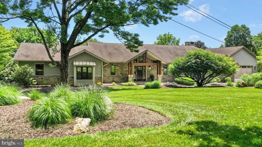 Offering a host of details distinguishing it from the ordinary, this amazing home will melt your heart at first approach. At entry, an impressive foyer opens through the living room to a wall of glass and private views over 2.2 acres. Sophisticated appointments are commonplace throughout, with nine foot and vaulted ceilings, white oak floors, and mission-style solid wood doors. The fabulous spaces have stylish amenities that share elements with Colorado architecture. A vaulted, skylit living room is anchored by a porcelain tile floor-to-ceiling floating fireplace and opens to the breathtaking kitchen, boasting magazine quality finishes and appliances.
 
This quietly sophisticated home has been beautifully executed. With only the best of enhancements, the custom design pays homage to light and livability. There are 4 bedrooms, 3 1/2 baths, a family room with built-ins, walkout basement, and 4 garages. The primary bedroom is a luxurious getaway with vaulted ceiling, 2 walk-in closets, and a stunning primary bath with soaking tub. Savant technology, geothermal HVAC, and a generator are a perfect complement to this lovely home.
 
Conveniently located in a wonderful Saucon Valley legacy neighborhood, Quarter Mile has all the amenities one would expect from a home of this caliber.