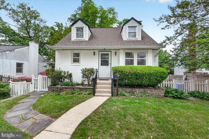Welcome to this sun-drenched Cape Cod located in this sought-neighborhood in Silver Spring! Step inside the spacious living room that opens seamlessly into the open concept eat-in kitchen, offering a wide-open space perfect for everyday dining and gatherings.
The main level features two comfortable bedrooms and a full bathroom, providing convenient one-level living. Upstairs, you’ll find a loft-style, oversized third bedroom that offers a unique and airy retreat.
The fully finished basement adds exceptional versatility, featuring a large recreation room centered around a beautiful stone-front fireplace. This level also includes a second kitchen with stainless steel appliances, a stylish white tile backsplash, and a full bathroom, making it ideal for multigenerational living, extended stays, or flexible use. With full baths and kitchens on both levels, the home is thoughtfully designed to accommodate a variety of living arrangements.
Step outside to enjoy your own private backyard oasis. A stone patio creates the perfect setting for outdoor dining and entertaining, surrounded by mature trees and beautifully manicured landscaping.
With its flexible layout and multiple living spaces, this Cape Cod is ready to meet the needs of its next owner. Don’t miss out, schedule your private showing today!
