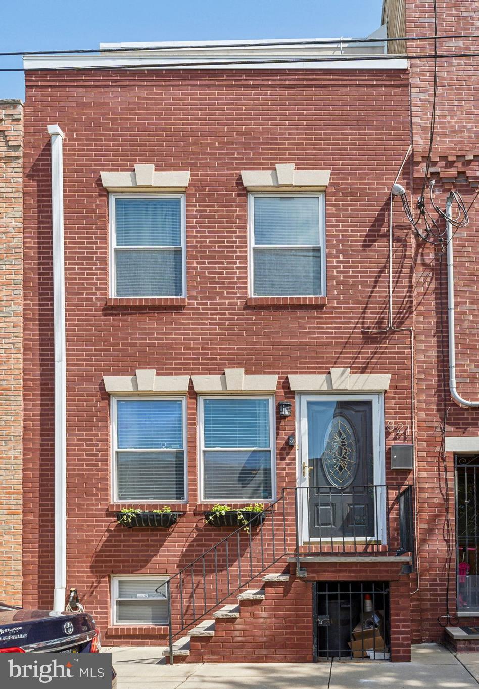 East Passyunk square is a great area to live in and this house is walking distance to some of the best restaurants and bars in Philadelphia. 821 Mountain St is a very warm, spacious and comfortable home. There are beautiful views of the city from the 3rd floor - and a potential deck off the primary bedroom. Enter into an inviting living room with ample space for lounging and then head back toward a beautiful kitchen that has tons of storage. Appliances are Maytag and Whirlpool. Walk out the back door to a large patio. Imagine summer barbecues and al fresco dining. Create an urban garden! On the 2nd floor there are two bedrooms, a laundry room, lots of closets and a large hall bath. The 3rd floor is the large primary bedroom and bath, along with a walk-in closet that has a window! There is a possible deck in the front of the house, just off the primary bedroom. 821 Mountain is wired for an ADT alarm system, and has a Ring Camera. This lovely house has 2-zone heat and air, gorgeous hardwood floors and lots of space for storage in the finished basement. It's all electric and very energy efficient. East Passyunk is a neighborhood with little corner stores all around and of course the famous Termini Bakery is only a block away. There are many excellent restaurants that are a short walk and it's close to the Broad St Subway and other public transportation . This is a wonderful home that's been kept beautifully in a fabulous neighborhood. It was built from the ground up ten years ago and it's been a joy to live in. Bring your clients!