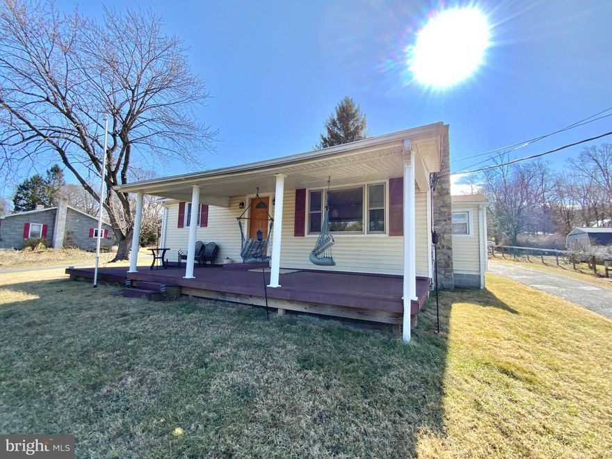 Quiet nights sitting on the front porch watching the sunset, who could ask for more?! Affordable, charming and well-maintained rancher with detached, oversized 2 car garage that has its own wood stove and newer concrete floor along with a garden shed. You will love the custom kitchen cabinets and separate bar area. 3 bedrooms, 1 bath and room to grow in the basement. Basement has an electric fireplace and just needs finishing touches. Hardwood floors throughout, plus wood stove in the living room. Quiet neighborhood close to Ft. Ritchie Community Center, Waynesboro and Fairfield. Schedule your showing today!!