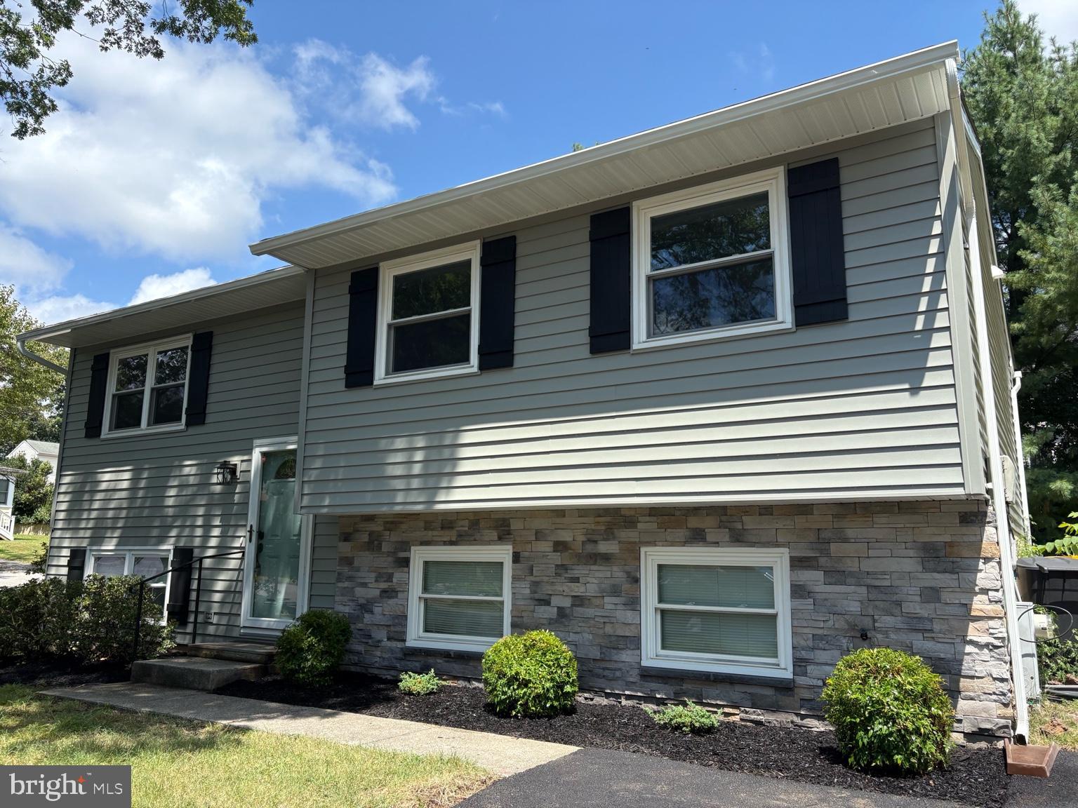 This beautifully updated split foyer in Severna Park is truly move-in ready. Featuring brand-new siding with a stylish stone front, a new roof, and a completely renovated kitchen with new cabinetry and countertops. The primary bath has been fully remodeled, and all flooring throughout the home is brand new. Fresh paint brightens every room, and the hall bath has been tastefully refreshed. Ideally located in the sought-after Severna Park School District and within walking distance to Kinder Farm Park. A perfect location for commuters with convenient access to Ft. Meade, NSA, Baltimore, Annapolis, and Washington, D.C.