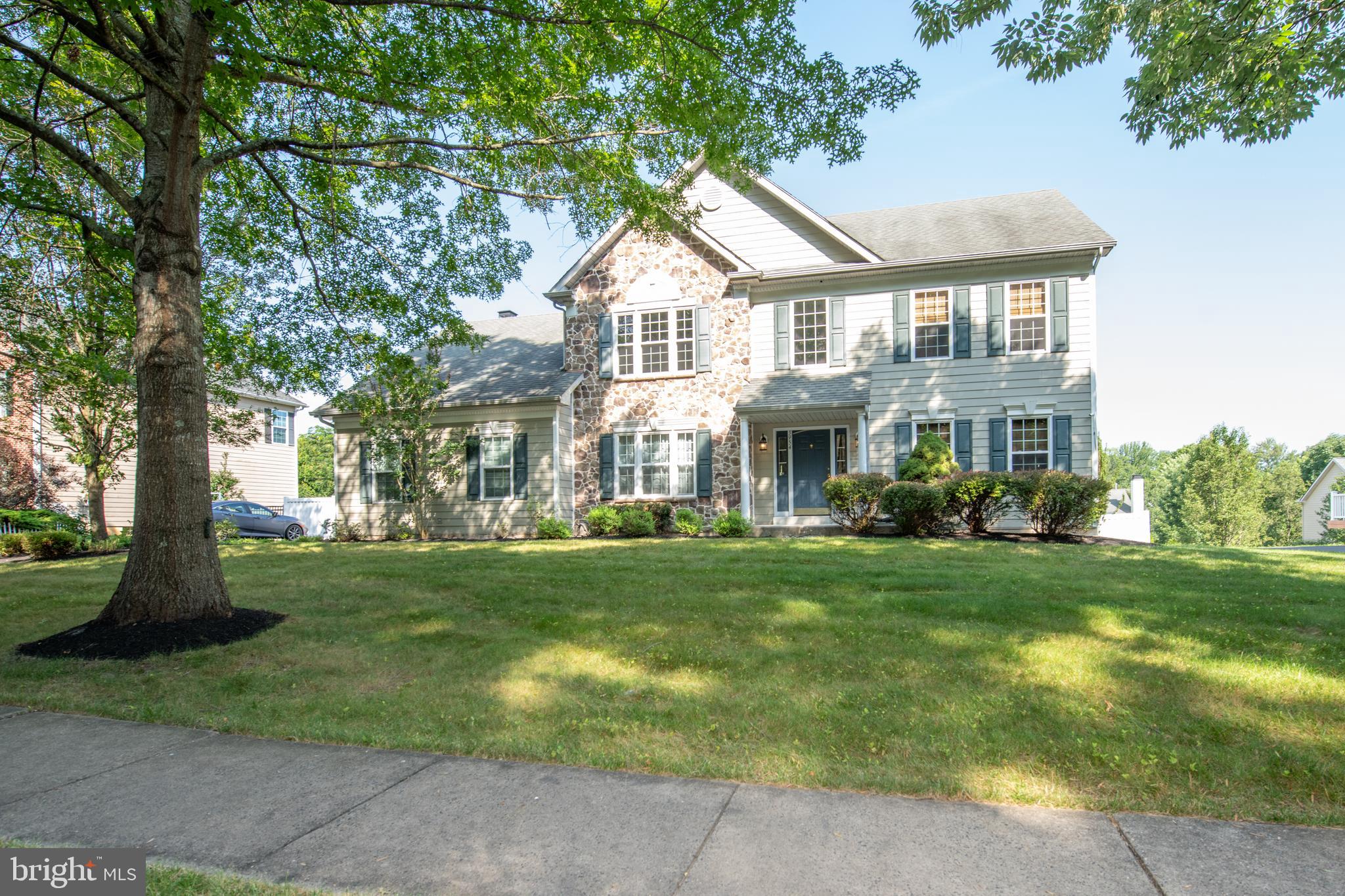 Welcome to 3954 Charter Club Drive, tucked into the sought-after Ridings of Buckingham community in Doylestown. This classic 4-bedroom, 2.5-bath home offers the kind of space and location that rarely come on the market—especially at a price this compelling.
From the moment you pull up, the curb appeal stands out. The mix of stone and newer fiber cement siding, updated windows, and mature landscaping all give the home a polished, welcoming look. Inside, wood floors stretch across the main level, connecting flexible living spaces that include a bright dining room, formal living room, and a vaulted family room with a gas fireplace and oversized windows.
The kitchen is generous in size, with warm wood cabinetry, stainless appliances, a center island, and room for a casual table by the sliders that lead to an elevated deck. There’s also a first-floor office—ideal for anyone needing a dedicated workspace . A large master suite with vaulted ceiling, private bath, dual walk-in closets, and 3 additional bedrooms can be found on the 2nd floor. The huge walk-out basement is ready for your vision, offering tons of potential for storage, a gym, or finishing down the line.
This home is a smart opportunity in a neighborhood where homes don’t come up often or at this price point—and when they do, they don’t last. With recent sales trending higher, this property offers strong value for buyers looking to make a move in Central Bucks County.
.