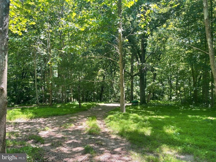 This beautiful 1 acre lot is within 600 feet of the Liberty Reservoir.  3100 acres of fresh water. Great place for boating, fishing, hiking and biking . More then 10 great trails to explore. This lot is gently sloping and is about 50-70 percent wooded. Located at the end of Friday Harbor Drive, this lot provides you a quiet location that will offer you tons of privacy.  While located within 10 minutes of over 100 shops and restaurants you could also feel like you are 100 miles from civilization.  This lot has a well (10 GPM) and perc approved.