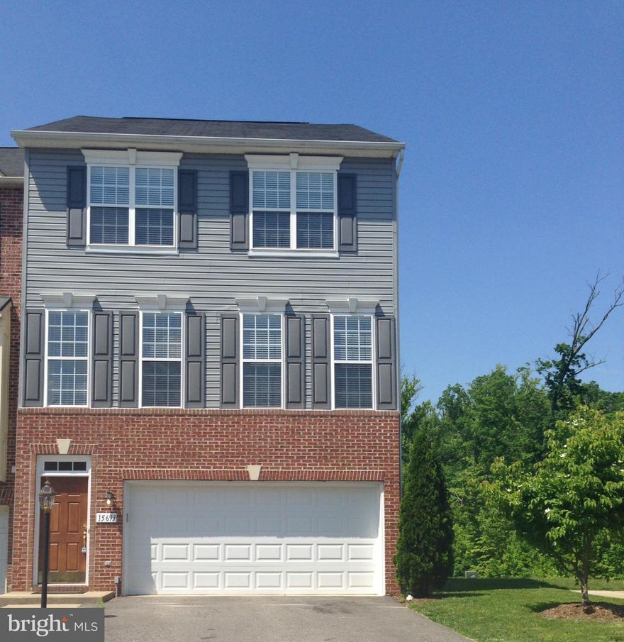 Just renovated end unit town home in popular Rippon Landing, close to shopping, restaurants & commuter routes.  Sides to tree save area, end of street, very quiet. Two car garage, new flooring throughout, new appliances, granite counters, fireplace in Family room.  Large Master suite with 2 walk in closets and 5 piece bath, w/d upstairs. Don't miss out!