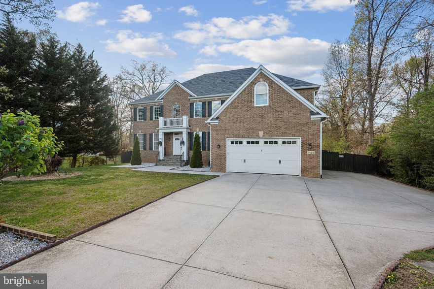 Stunning 6 bed, 5.5 bath colonial on a half acre lot in Windsor Estates. Walkout lower level has a proper 6th bedroom and a bonus 7th bedroom! Oversized 2-car garage with additional storage space and driveway parking for 4/5 cars. Fully fenced rear yard with elevated trex deck, gazebo, and pizza oven. Two-story foyer and living room with coffered ceiling and gas fireplace. Kitchen with pantry, stainless steel appliances, gas cooking, wine fridge, and quartz countertops. Main level bedroom and two staircases to the upper level. Four upper level bedrooms all with their own full bathroom. Oversized primary bedroom with sitting room. Primary ensuite has double vanities, soaking tub, spacious walk-in shower and a large walk-in closet. Walkout basement has one legal bedroom, one bonus bedroom, full bathroom, bar/kitchenette, and storage space. Two sets of full size washer & dryers in the property, one on the main level and one in the basement. Both HVAC's replaced inside & out in 2023. Roof replaced in 2023. House freshly painted, bidets added on toilets, and recessed cans added throughout. Overflow parking easily accessible at the field's parking lot across the street. Close proximity to library, new hospital center, Wegmans, Kingstowne, Springfield Mall, Franconia-Springfield metro stop, and all major commuting routes. Across the street from Lane Elementary.