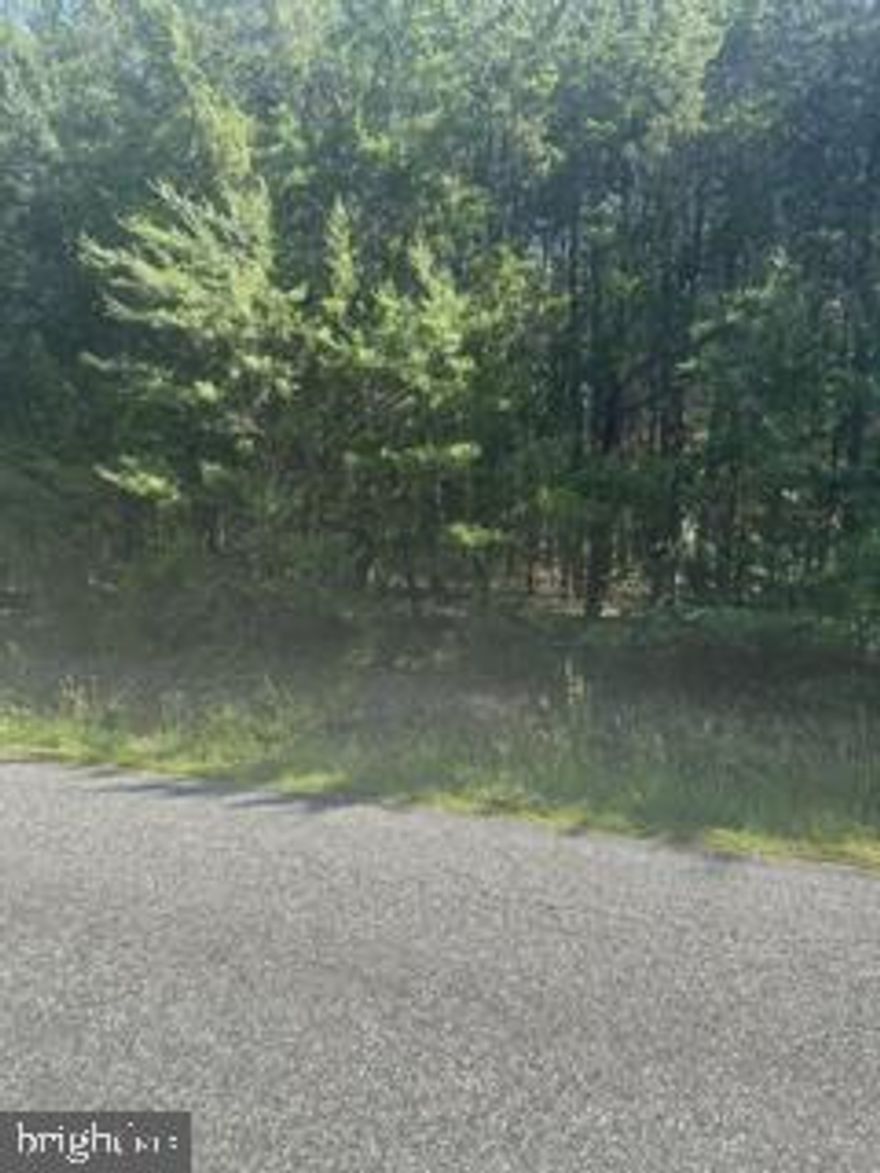 Exceptional opportunity to own 10.28 acres in the desirable Battlefield Estates community of Spotsylvania County. This beautiful wooded parcel offers a serene natural setting with mature trees and peaceful woodland views. Enjoy the privacy or country living while remaining conveniently located near shopping, dining, schools, and major commuter routes. Whether you envision building your custom dream home or holding as an investment, this property provides the ideal balance of seclusion and accessibility. Endless possibilities await on this scenic acreage.