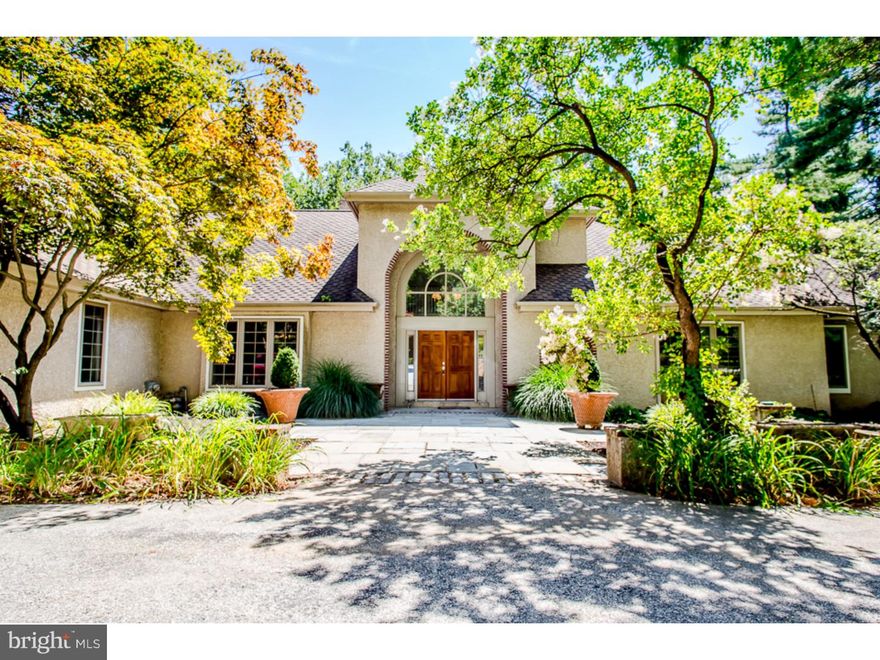 Welcome home to this 2.5 acre mini-estate on very desirable lane in prestigious Gladwyne. This lovely 4 BR/3.5 BA home with Master on first floor lends itself to a floor plan perfect for both a family or downsizers. Enter through an elegant motor court into the home's grand front entry.  Large 2-story foyer with elegant staircase opens to step-down living room with gorgeous millwork, coffered ceiling, custom built-in shelves and gas fireplace.  Beautiful French doors opening to slate terrace is perfect for entertaining. Fabulous eat-in chef's kitchen complete with Viking appliances, granite countertops , bar area with Sub-Zero wine refrigerator.  Sunny every day dining area with gas fireplace and wall of windows overlooking tranquil rear yard. Handsome formal dining room with millwork is perfect for more formal dining and entertaining. Convenient laundry room behind kitchen with great storage.  Bonus room could be a perfect office or exercise room plus powder room.  Access to 3-car attached garage. Opposite end of this living floor boasts a fabulous master-suite oasis.  Large master bedroom with en-suite dressing room/master bathroom.   Separate vanities, 2 water closets, master bathroom with soaking tub, step-in shower with frameless glass doors and access to rear yard.  Large walk-in closet with custom built-ins. Additional bedroom suite with en-suite bathroom is perfect for guest quarters or elegant home office. Second floor features 2 additional bedrooms and hall bathroom. Perfect location in Lower Merion School District.  Easy access to the charming village of Gladwyne, King of Prussia, major highways and so convenient to Center City.