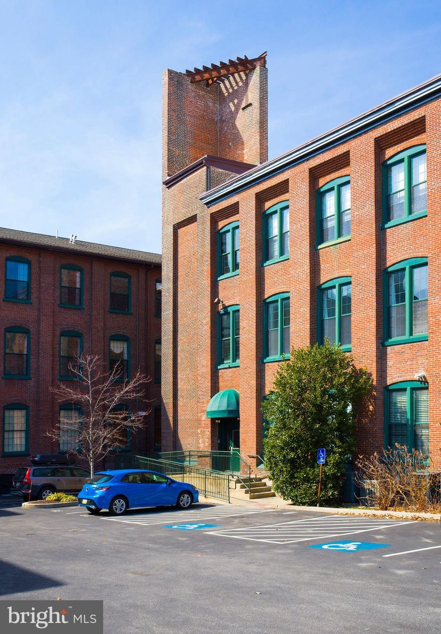 Best value at the Byrne Lofts! Discover urban living at its finest with this cozy 1-bedroom, 1-bathroom Manhattan-style condo in the sought-after Byrne Lofts, Phoenixville. This affordable second-floor gem has been freshly painted and is move in ready. This kitchen is perfect for anyone who loves to cook, showcasing custom maple cabinets, a convenient pantry, and a spacious island ideal for entertaining. Its open-concept design seamlessly connects to the living room, creating a perfect flow for hosting gatherings and daily living.

Enhancing the loft experience are the 12-foot ceilings, exposed beams, ductwork, and original hardwood flooring, all beautifully complemented by oversized windows that provide the space with natural light. The generous bedroom includes a large closet offering ample storage. 

Additional features include new hot water heater, and an in-unit washer and dryer. Parking is convenient with one dedicated spot. Byrne Lofts exemplifies urban loft living in the charming Chester County town of Phoenixville. 

Residents enjoy community amenities such as an onsite fitness area, elevators, and low condo fees and taxes. This pet-friendly community is ideal for those seeking minimal maintenance, with the convenience of being able to lock up and travel at ease. You'll find yourself within walking distance of local bars, restaurants, and shops, and just a short drive from Valley Forge Park and King of Prussia. Experience the perfect blend of style, convenience, and community at Byrne Lofts.
