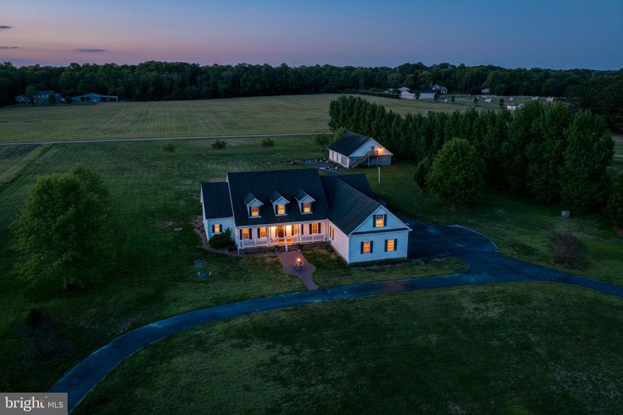 Welcome to this exceptional Cape Cod–style residence, offering an ideal blend of space, functionality, and opportunity, all situated on 4.25 private acres. This expansive home features five bedrooms and three and one-half bathrooms, encompassing more than 2,500 square feet of finished living space, along with an additional 950 square feet of unfinished area ready to be customized to suit your needs.

The main home presents a classic and versatile floor plan with generously sized living areas, well-suited for both everyday living and entertaining. The spacious kitchen flows seamlessly into the dining and living areas, while multiple bedrooms provide flexibility for guest accommodations, home offices, or multi-generational living. A dedicated office includes French doors, custom-built bookcases, and refined architectural details such as crown molding and wainscoting, which are featured throughout much of the home. The inviting living room is enhanced by a propane gas fireplace, adding warmth and character.

Car enthusiasts, hobbyists, and business owners alike will appreciate the exceptional garage capacity. In addition to the attached three-car garage, which includes an elevator providing access to a storage area, the property also features an impressive detached six-car garage complete with a full bathroom-ideal for a workshop, vehicle or equipment storage, or a home-based business.

Surrounded by open space and natural beauty, this property offers a high degree of privacy while providing ample room for expansion, gardening, or outdoor enjoyment.

This is a rare opportunity with endless potential. Schedule your private showing today to experience all that this unique property has to offer. Please note that the home is part of an estate and is being conveyed in its current condition; no repairs or improvements will be made by the seller.