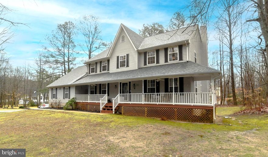 Welcome to this spacious 4-bedroom, 3.5-bathroom home situated on a sprawling one-acre corner lot. This charming residence boasts a formal living room and dining room, perfect for hosting gatherings and special occasions. The large kitchen features brand new quartz countertops and flows seamlessly into the adjacent family room, complete with a cozy gas fireplace. Off the family room you can enjoy a fully screened in back porch which is an ideal spot for relaxation and entertainment.

Downstairs, the fully finished basement offers additional living space, ideal for a home office, gym, or recreation area. A three-car garage provides ample parking and storage space for vehicles and equipment.

Outside, the expansive yard offers endless possibilities for outdoor activities and landscaping projects. With its prime location and modern amenities, this home combines comfort and elegance, providing the perfect retreat for you and your family to enjoy for years to come.