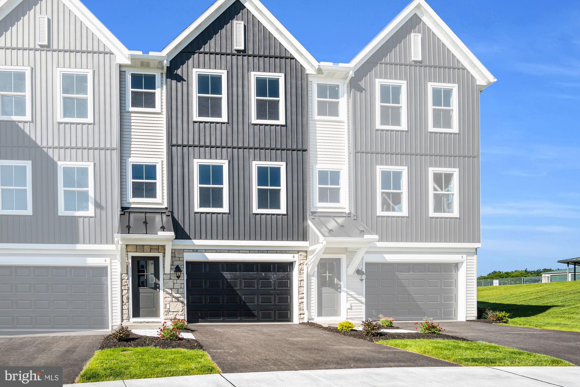 Introducing Garman's latest townhome, the Carson, now available in our charming new community, Creek Terrace. This limited opportunity features a stunning turnkey homes that showcases exquisite design packages and includes a walkout storage area from the basement. The main level boasts a spacious open-concept design, seamlessly integrating the dining area, kitchen, and living room for effortless entertaining and everyday living. Upstairs, you’ll find a generous owner’s suite along with two additional bedrooms, a full bath, and convenient laundry facilities. The lower level offers a large 1.5-car garage complete with an automatic opener, plus ample unfinished storage space to suit all your needs. Don't miss your chance to call the Carson home—schedule a tour today!