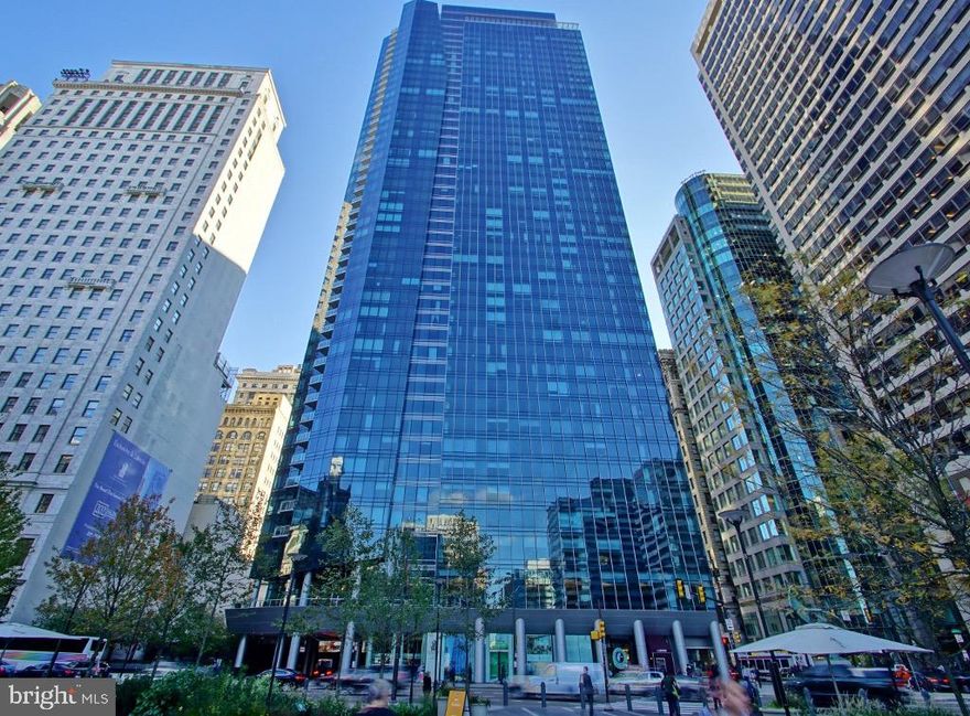 Enjoy the unparalleled amenities of The Ritz-Carlton and the spectacular views of City Hall and Dilworth Plaza out of your living room and your bedroom. The Residences at The Ritz-Carlton has an extremely central  location on The Avenue of the Arts. This contemporary one bedroom home in a sleek glass tower features a gorgeous top of the line kitchen with an island, a living room./dining area with a glass enclosed nook for a desk, a marble half bathroom with a washer/dryer and a spacious bedroom, with excellent closet space and a classic Ritz Carlton marble bathroom with a separate shower, large tub and double sinks. This home with hardwood floors throughout and floor to ceiling operable windows also includes 1-car valet parking with a monthly fee presently at $165.64. The building offers a 7,000 square foot fitness center with 60-ft lap pool, residents' lounge, door person, outdoor terrace, tranquility park with waterfall, media & yoga room, catering pantry, car service. Hotel amenities include room service, housekeeping, laundry, spa service at additional charge. Tenant pays electric and cable separately.