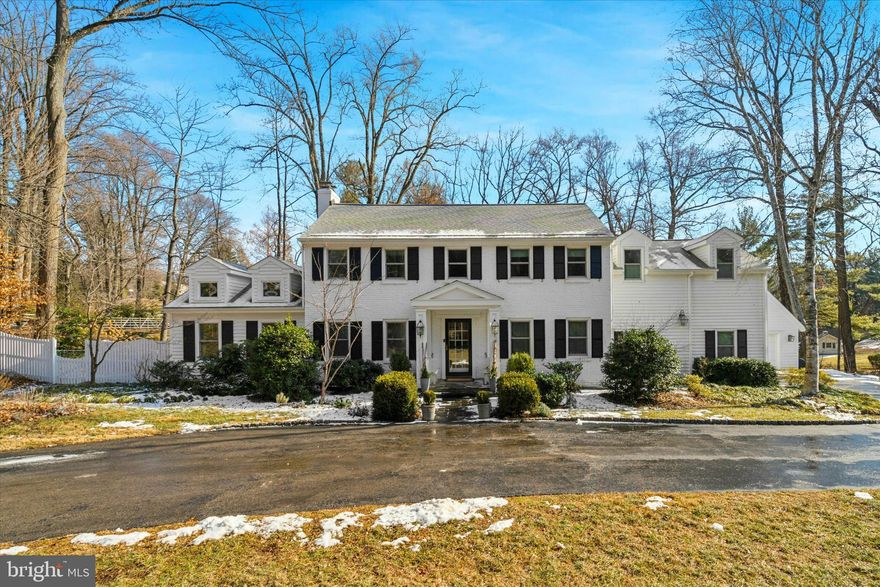 Ideally located steps from the center of Gladwyne, this elegant and spacious home offers a perfect blend of luxury and comfort, boasting 3,631 square feet of beautifully designed living space. A seated, covered entryway greets you as you step inside to discover a welcoming atmosphere with a casual grace that flows throughout the home. The stunning newer Kitchen is a chef’s delight and features Woodmode cabinetry, granite counters, a large center island, and a built-in desk with bookcases. Stainless steel appliances include a Wolf range, separate Wolf oven, Subzero refrigerator, and a new Bosch (2022) dishwasher. The Kitchen opens to a charming Family Room with a wood-burning fireplace and built-in cabinetry. Sliding doors lead to a large wrap-around patio, perfect for enjoying peaceful mornings with a cup of coffee, or to host family and friends for dinner using the built-in gas grill. A motorized awning can be put to use on hot summer days. Off the Kitchen is interior access to the attached two-car garage and a delightful Butler’s Pantry with divided-light upper cabinets. The Dining Room features a tiled two-sided gas fireplace and steps down into a Sunroom addition with vaulted ceilings, skylights and doors to the patio. The slate surround fireplace makes this room perfectly cozy all year round. Graceful transitions from room to room are well suited for both casual get-togethers and sophisticated entertaining. A well-sized Office, Powder Room, and coat closet complete this floor. The Primary suite boasts a spacious, sunny bedroom, walk-in closet, dressing area, and an additional cedar closet. The spa-like tiled bath features a large double vanity with granite countertop and plenty of storage, a seamless glass shower, and a jetted tub. Three skylights in the Suite provide abundant natural light. Two additional bedrooms on this level share a well-appointed double vanity hall bath. The third bedroom has an en-suite bath. A convenient laundry (with pull down attic stairs) is also on this level. The carpeted lower level of the home is well suited as a Bonus Room, gym, or home office with direct interior access to the attached garage and generous storage space. There is an additional one-car detached garage and a whole-house generator. Updates include a new roof on the house and garage in 2020, new HVAC in 2018 including conversion from oil to natural gas, and exterior painting in 2023. See complete list of updates in Documents. Steps from all that Gladwyne has to offer including Home Room, the library, McCaffery’s, Bridlewild Trails, and the park. Easy proximity to Center City, King of Prussia. Top rated Lower Merion Schools and all the dining, shopping, and entertainment on the Main Line. Please note that the Sellers used the original Living Room as the Dining Room, and the original Dining Room as the Office. These can very easily be switched back.