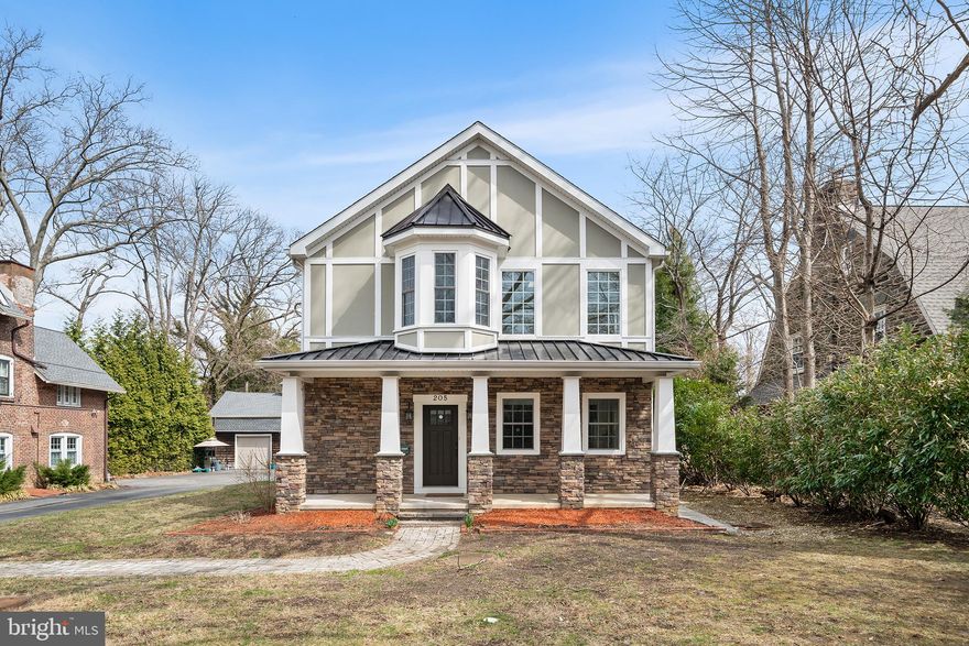 SUNDAY OPEN HOUSE CANCELLED! Urban convenience meets suburban charm at this newer construction Lower Merion home situated less than seven miles from Center City! A stone-pillared porch graces the front of the home, which is bordered by mature trees and plantings for privacy. Step inside and admire the numerous upgrades and amenities throughout, including gleaming hardwood floors, abundant natural light, newly carpeted bedrooms and a seamless flow. The home’s centerpiece—a two-story great room featuring a stone-surround gas fireplace and oversize architectural windows—offers an ideal spot to relax and gather. Just beyond is the open kitchen with island seating, new quartz countertops and tile backsplash and glass sliders that open to a side patio. Directly across from the kitchen sits a flexible dining space ready to accommodate your every entertaining need. Tucked away in the rear corner of the main floor you’ll find a cozy bedroom with ensuite full bath and glass sliders that open to the rear stone patio and greenspace. This floor also boasts a home office with French doors and a double-door side entry adjacent to the attached garage. Upstairs, you’ll find two secondary bedrooms, both with ensuite full baths, plus a laundry room. The hallway ends at the bright and airy primary suite with ensuite full bath that includes his and her vanities and a soaking tub. There’s also a large walk-in closet with custom organization system and direct access to a rear porch. Back downstairs, the fully finished basement boasts new carpet, additional storage and an open, easily adaptable space for relaxation and play.  Energy efficient leed certified home with geothermal HVAC system & spray foam insulation.  The flat, tree-lined backyard offers ample privacy plus a stone patio and a covered area for shade or even extra parking. Stroll the sidewalk-lined streets to numerous area attractions and conveniences, including the Cynwyd Club, Cynwyd Heritage trail, award-winning Lower Merion schools and the Cynwyd train station. Make plans to tour this turnkey urban-suburban charmer today!