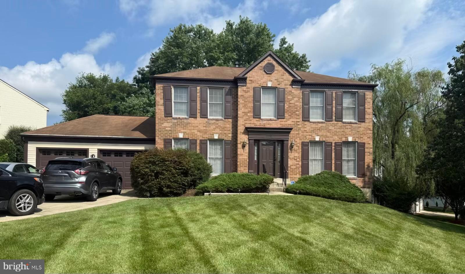 Don’t miss the opportunity to own this charming brick-front colonial situated on a desirable corner lot. This home features a spacious kitchen with an island, granite countertops, stainless steel appliances and upgraded cabinets. The inviting family room offers a cozy fireplace, while the finished basement includes a rec room, bonus room, wet bar, powder room, and a large laundry room. The main bedroom boasts a relaxing sitting area and a full bath with a skylight. Conveniently located near shopping, restaurants, I-495, and more!