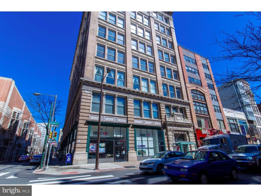 Welcome to your true NY style corner loft condo located in the historic Pitcairn Building which is an 8-Story well-managed building in one of Center City's most hip locations. 10 foot high windows wrap the unit and allow for an incredible amount of sun exposure and the unit has 15+ ft soaring wood beamed ceilings. Kitchen comes complete with SS appliances, gray cabinetry. Iron stair case leads to the mezzanine level with a master bedroom. Both bathrooms are tiled with whirlpool tubs. Bonus storage area off master bath. Washer & dryer are located on the main level. Nice closet space. Very cool space and an excellent value. The building is in a prime location. 99 Walkscore and on its way to 100! Not only 1 block to reading Terminal and easily walkable to all that Center City has to offer including an ever-expanding array of trendy shops, restaurants, markets, and more. Entrance From Arch Street into spacious & beautiful Terrazzo lobby to modern passenger elevators. 2 Bedroom/2 Bath bi-level loft is designed for flexible and creative use of the open floor plan. Easy access in and out of the City with Septa Rail and Buses...major highways nearby. Parking lots nearby. Building is FHA approved and warrantable. A really cool loft in an awesome location.