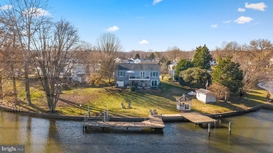 Perfectly situated at the end of a quiet cul de sac is this waterfront 4 bedroom, 2 full and 1 half bathroom house with designer touches throughout.  Thoughtfully updated with neutral paint, fresh lighting and updated kitchen and baths, this home has it all- including 125' of water frontage on Taylor Creek.  Designer inspired kitchen with white cabinetry, tiled backsplash and stainless appliances.  Big views from nearly every room!  Rear yard is perfect for entertaining.  Storage shed plus 1 car garage.  Close to shopping, dining & entertainment. Schedule your private tour today!