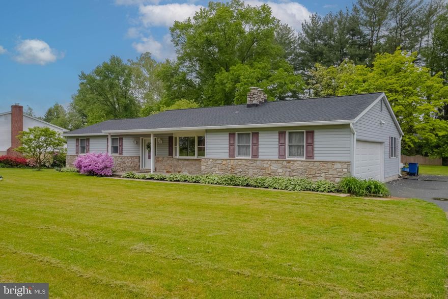 BEAUTIFUL RANCHER with Covered Front Porch & oversized 2 car side load garage! Location! Fallston Schools, Features 3 Bedrooms, 2 full baths, Living room with fireplace, hardwood floors, fresh neutral paint & new carpeting. Large eat-in-kitchen  with sliders to deck, granite counter tops, first floor great room perfect for entertaining with the family., New Roof,  The large level yard is beautiful, great deck, patio and trees! Awesome neighborhood!!