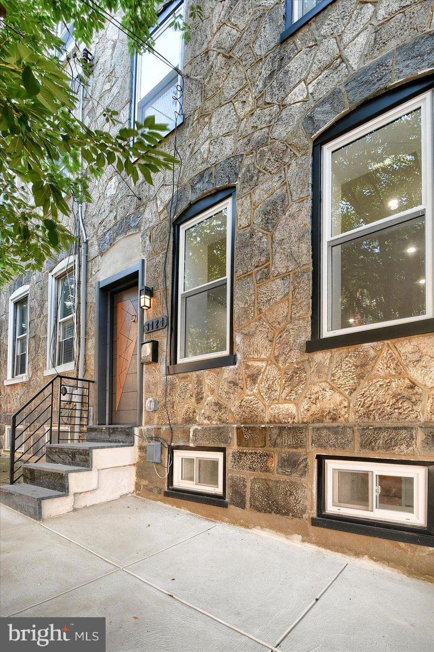 MAJOR PRICE REDUCTION!!! Welcome to 3424 Sunnyside Ave – Modern Elegance Meets Classic Philadelphia Charm
Located on a quiet, tree-lined block, this home delivers modern city living at its finest. This stunning, fully renovated 3BR/2.5BA rowhome in the Heart of Philadelphia's East Falls neighborhood has been completely transformed with high-end finishes and impeccable attention to detail, offering the perfect blend of modern luxury and timeless charm.
Step inside to find an open-concept main level flooded with natural light, recessed lighting, featuring luxury vinyl floors, and a thoughtfully designed layout. The heart of the home is the kitchen, equipped with quartz countertops, an abundance of cabinetry, stainless steel appliances, and a large center island. Step outside of the kitchen to your own backyard oasis, perfect for those summer evening BBQ's.  Rounding out the first floor is the convenient half bath to accommodate all of your guests. 
Upstairs, on the second floor, are two generously sized bedrooms with large windows and ample closet space, 3 piece bathroom with rain shower head, and lighted mirror, and premium fixtures in a classic black and white theme.  On the third floor, you will find a luxurious primary suite with a spa-inspired ensuite bath boasting designer tile, frameless glass shower, and premium fixtures. 
On the lower level, the fully finished basement is perfect for a home office, gym, or media room. With all-new HVAC, plumbing, Energy-efficient windows and doors, and electric systems installed in 2025, all you need to do is move in and unpack. 
Conveniently located with easy access to public transportation, parks, shopping, and dining, this home delivers modern city living at its finest. Don’t miss your opportunity—schedule your private showing today!