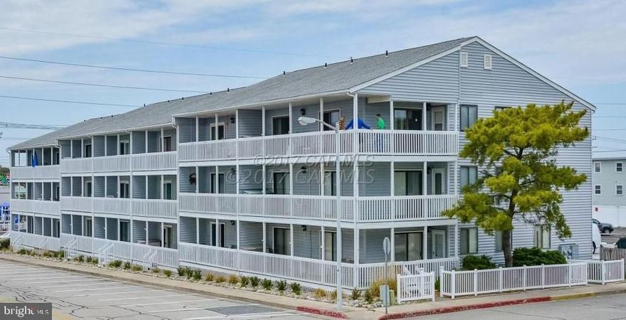 OCEAN BLOCK LOW MAINTENANCE TWO BEDROOM SECOND FLOOR CONDOMINIUM. NON-RENTAL, THIS COMFORTABLE UNIT HAS OPEN KITCHEN, DINING AND LIVING ROOM DESIGN. PEOPLE WATCH FROM YOUR LARGE SOUTH FACING BALCONY. ONLY A FEW STEPS TO THE OCEAN. NEAR SHOPS, RESTAURANTS, MINI-GOLF AND MUCH MORE FUN. TWO ASSIGNED PARKING SPACES. FRESH LANDSCAPING AT STREET SIDE.