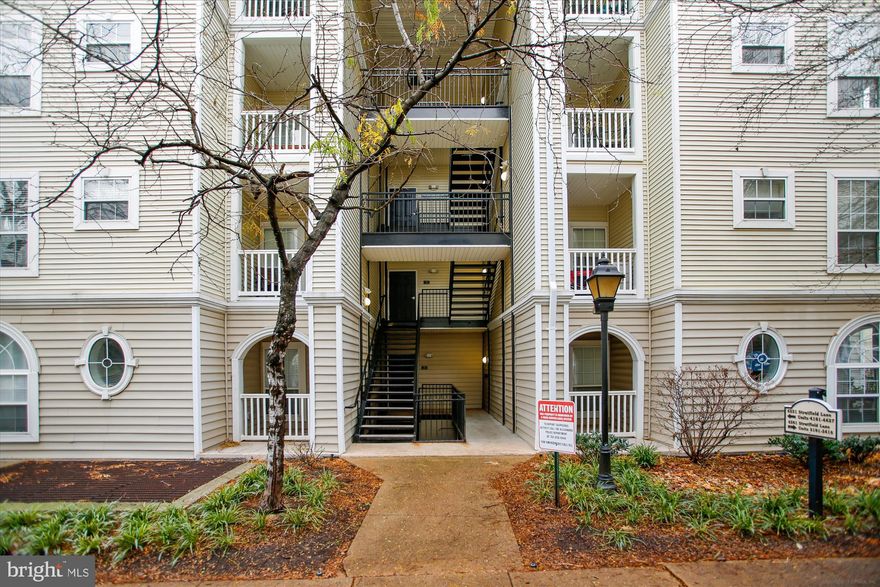 2 Bedroom, 2 Full Bath Sunny Condo with almost 1100 sq ft of Living Space.  The Kitchen Features a Breakfast Bar, Newer Fridge (2024), and Granite Counters. You will Love the Open Layout, Large Bedrooms, Walk in Closets, and Covered Balcony. New Tankless Water Heater (2024). In addition to Two Garage Parking Spots, a Rare Storage Room Conveys too.  The Large Storage Room is 9ft long and 6 feet wide.  Community Amenities include Elevators, Outdoor Pool, Gym, and Clubhouse. Super Location Close to King Street and 395. Easy Travels to Old Town Alexandria, Shirlington, and DC.  Pet Friendly too! Easy to show.