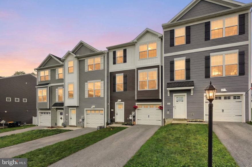 Welcome home to this beautifully designed 3-level townhome offering the perfect blend of space, comfort, and value! Featuring 4 bedrooms and an open-concept layout filled with natural light, this home is ideal for both everyday living and entertaining. The versatile lower-level bedroom provides endless possibilities , perfect for a home office, playroom, guest space, or man cave.

The heart of the home boasts upgraded stainless steel appliances, a spacious living area, and seamless flow throughout. Enjoy your morning coffee or host friends and family on not one, but two private decks designed for relaxing and entertaining. Upstairs, the spacious primary suite includes a walk-in closet and plenty of room to unwind.  Other highlights include the entire home being only 6 years old, an upper-level laundry closet, and an unobstructed view off the two back decks.  

Conveniently located just 10 minutes from the Maryland line, this home offers an easy commute while maintaining an affordable lifestyle with a low-cost HOA. Whether you're a first-time buyer, growing household, or investor looking for strong value, this townhome delivers incredible space, flexibility, and comfort for the price. Don’t miss your opportunity to make it yours!