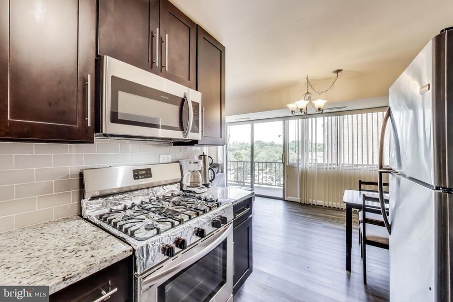 Welcome to The Seasons! This charming 1-bedroom, Den & 1-bathroom condo at 5851 Quantrell Ave #407 in Alexandria, VA, offers a comfortable and convenient lifestyle. Gorgeous condo features updated kitchen w/ granite countertops, beautiful brown cabinets & stainless steel appliances including 5- burner gas range, with many upgrades. LOCATION, LOCATION, LOCATION.. Step inside to find a thoughtfully designed living space spanning approximately 826 square feet. This unit features central air conditioning and forced air heating, ensuring year-round comfort. 

Experience breathtaking views from this stunning, light-filled top-floor condo in a secure building with elevator access. Residents of The Seasons enjoy a fantastic array of community amenities, including an outdoor swimming pool, tot lots/playgrounds, elevator access, and on-site laundry facilities.

The location is truly exceptional, offering easy access to dining, shopping, and parks. Commuters will love the proximity to I-395, I-95, and I-495, as well as nearby bus stations that provide direct access to the Pentagon and Pentagon City metro stations. Old Town Alexandria and major military bases are just minutes away. All essential utilities (gas, electricity, water, sewer, trash, common area maintenance, snow removal) are included in the monthly Condo fee.