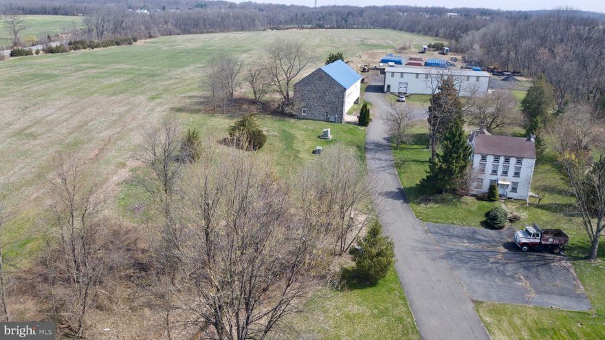 This 45 +/- acre parcel with Industrial Zoning is located on Big Rd (Rt 73) where it meets Layfield Rd (Rt 663). The location offers easy access South to Pottstown, North to Quakertown or West to Reading. Structures include colonial style 2 story home / office, stone barn and manufacturing building. The site is level, open and bordered by trees. Call for details.