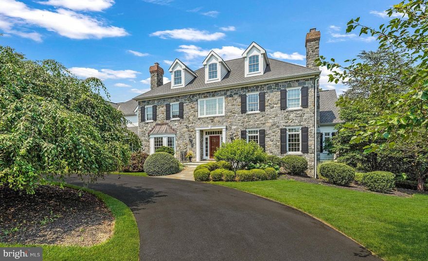 Rare opportunity in prestigious community of Versailles, privately located beside exclusive Bidermann Golf Course.  Classic stone center hall colonial, exquisitely appointed with custom millwork, Saienni staircases, hardwood floors throughout, Baldwin hardware, gracious entry, formal living & dining rooms, open family room, expertly appointed kitchen with sunny breakfast room, well equipped butler pantry, wet bar, main floor office, main floor bedroom ensuite, second floor primary suite, 3 additional 2nd floor bedrooms en suite, finished walk out basement with fireplace and full bath,  finished second floor bonus space and much more!