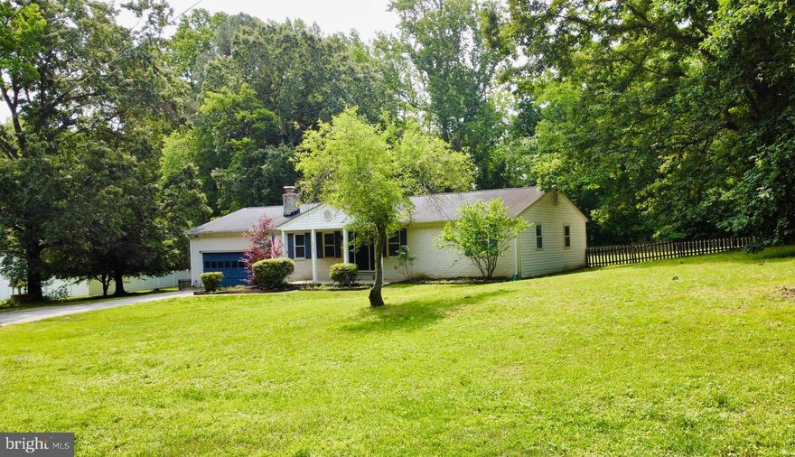 Bring your front porch swing, it’s already prepped ! Enjoy this charming rambler on a large 1.29 Acre level  lot w/ a fenced rear yard & walking distance to the Marina (Port Tobacco Marina). Solid surface flooring except for bedrooms,  kitchen filled with natural sunlight & exit to the decking & rear yard, cozy family room w/ fireplace and built ins, spacious bedrooms. Two car oversized garage,  office off of kitchen & garage area, mud room w/ laundry, . NO COVENANTS. Great private location too.