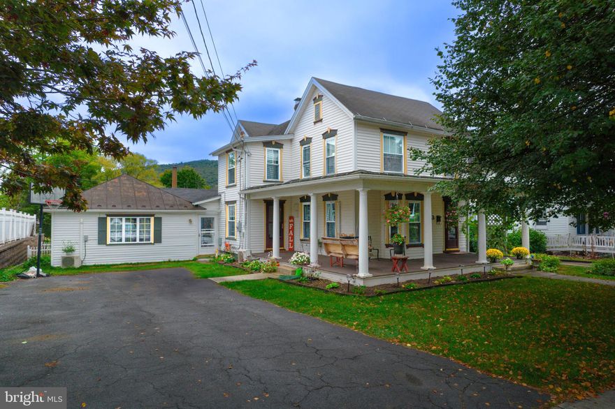 Get ready to FALL in love with 433 S Juliana Street! Discover the charm of this expansive residence nestled in the heart of Bedford Boro. It boasts a sizable recreation room adjacent to the kitchen, complete with a cozy wood stove. The kitchen offers ample storage and a pantry, along with plenty of counter space for meal preparation. Enjoy the convenience of a first-floor master bedroom with an en suite bath, and a laundry room also on the main level. The elegant dining room and living room feature hardwood floors that lead to a wrap-around porch. Half bath off living area. Upstairs, four bedrooms await, alongside an extra sitting area with a coffee bar. There's also a full bath on this floor. Outside, relish the screened porch that opens to a deck, and a flat, fenced-in yard. Just few blocks from downtown Bedford and walking distance to Bedford Middle and High School. Welcome Home!