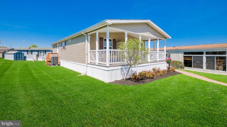 Wow! Curb appeal plus and so much more! Beautiful 2 Bed, 2 Bath rancher with over 1,240 sqft.  Built in  2010 the home features an open layout, bedrooms on each end of the home for privacy. Enjoy your morning coffee as you watch the sunrise on your covered front Trex deck! Excellent location within a few steps from the new Clubhouse that features a fitness room, library, game room and huge community room. Walk out onto the veranda that overlooks the heated pool! Weekly shuttle to markets along with many activities and trips. Make your appointment today! Professional pictures coming soon