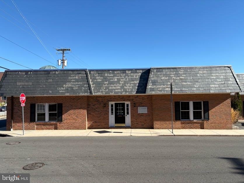 Discover an exceptional commercial space in the heart of Downtown Salisbury, perfectly positioned for legal professionals and businesses seeking a prime location. This newly renovated 2,200-square-foot office space sits at a prominent corner location, offering unmatched convenience and visibility.
Step into a thoughtfully designed professional environment featuring modern upgrades throughout. The space showcases a fresh, contemporary look with its newly installed ceiling tile grid and energy-efficient LED lighting system. The well-planned layout includes a welcoming lobby that sets the right tone for clients, a functional workroom for team collaboration, private offices for focused work, and a professional conference room for important meetings.
Location is everything, and this property delivers. Situated directly across from the District Court and just a block from the Circuit Court, it's an ideal setting for legal practices. The adjacent Post Office adds another layer of convenience for daily business operations. Adding to the area's vitality, the property faces the exciting new residential development, The Ross, contributing to the neighborhood's growing professional atmosphere.
One of the most attractive features? Say goodbye to downtown parking hassles with complimentary parking spaces right at your doorstep. This rare amenity in a downtown location ensures convenience for both staff and clients.
Whether you're expanding your business or relocating to a more prestigious address, this renovated office space offers the perfect blend of professional atmosphere, modern amenities, and prime location. Make your move to Downtown Salisbury's thriving business district.