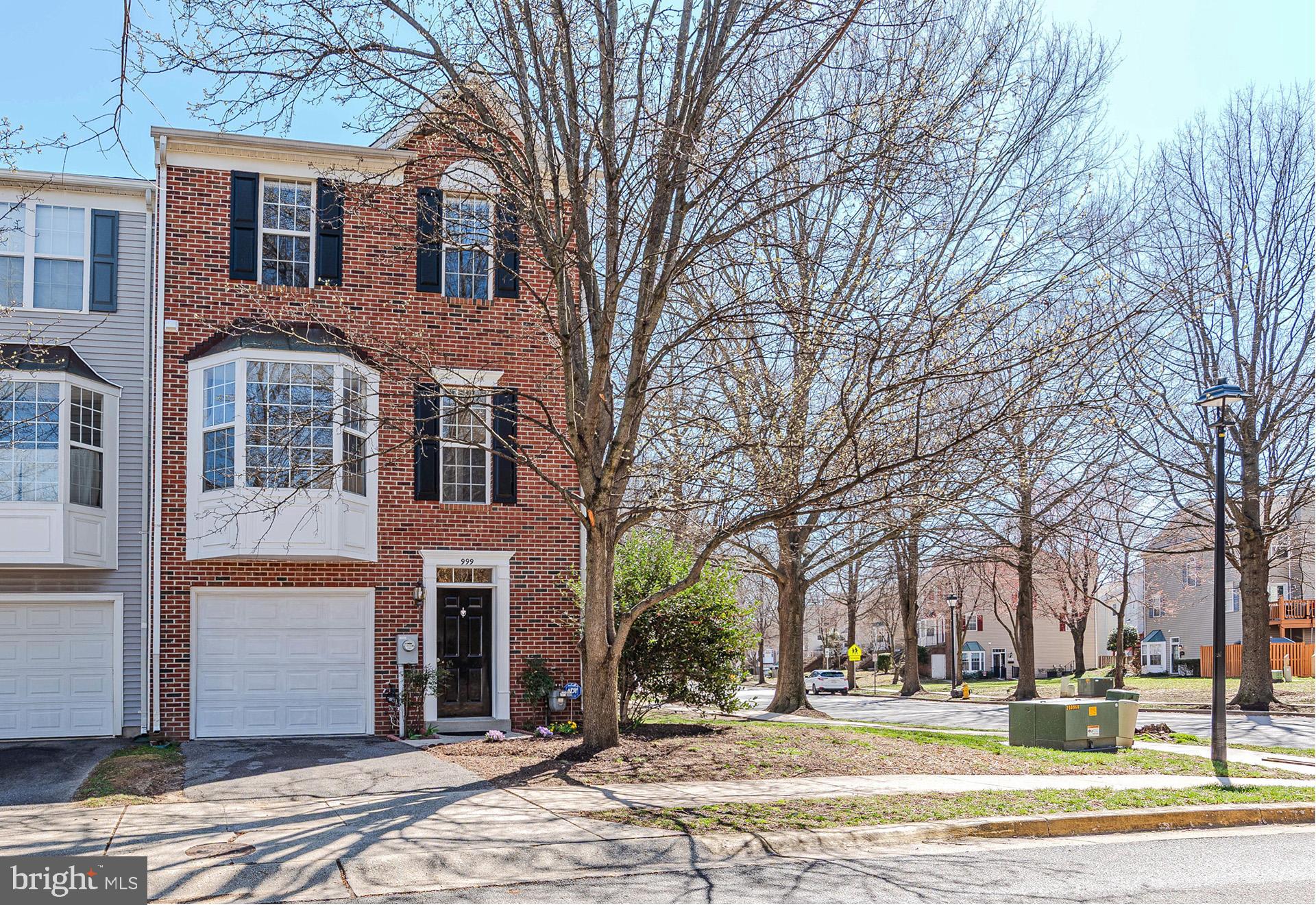 Spacious Brick front End Unit garage townhouse, features include: New Roof (2023) * Gleaming hardwood flooring and gas fireplace * Front bump-out window upgrade on 2nd level * Gourmet Kitchen with Stainless steel appliance, gas stove, and island * Bump-out window upgrade for eat-in area * Deck * Built-in desk, ideal for work at home! Primary Bedroom with vaulted ceilings and walk-in closet * Primary Bathroom has soaking tub with jets, separate shower and dual sinks * Bedroom 3 has custom built-in desk great for home office * Finished bright, open lower level has slider to backyard * Custom picture molding in foyer * Lower level half bath rough-in * Interior of home painted (2025) * Wonderful community amenities: community pools, tennis courts & playground * Walking distance to Elementary school * Easy access to shopping, great dining & movies right at Waugh Chapel * Great location for commuting to: Ft. Meade, Annapolis, Baltimore & Washington D.C. * Home truly in turn-key condition!