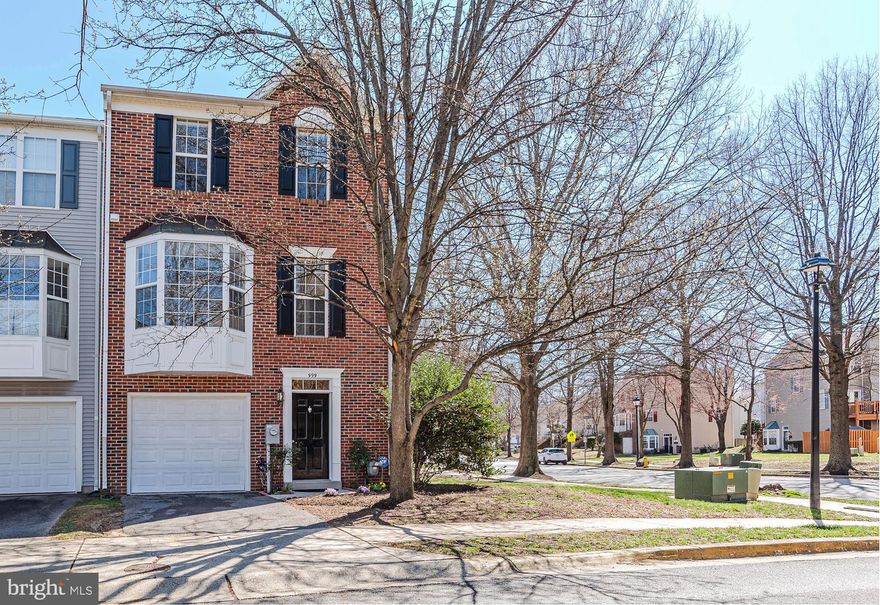 Spacious Brick front End Unit garage townhouse, features include: New Roof (2023) * Gleaming hardwood flooring  and gas fireplace * Front bump-out window upgrade on 2nd level * Gourmet Kitchen with Stainless steel appliance, gas stove, and island * Bump-out window upgrade for eat-in area * Deck * Built-in desk, ideal for work at home!  Primary Bedroom with vaulted ceilings and walk-in closet * Primary Bathroom has soaking tub with jets, separate shower and dual sinks * Bedroom 3 has custom built-in desk great for home office  * Finished bright, open lower level has slider to backyard * Custom picture molding in foyer * Lower level half bath rough-in * Interior of home painted (2025) * Wonderful community amenities: community pools, tennis courts & playground *  Walking distance to Elementary school * Easy access to shopping, great dining & movies right at Waugh Chapel * Great location for commuting to: Ft. Meade, Annapolis, Baltimore & Washington D.C. * Home truly  in turn-key condition!