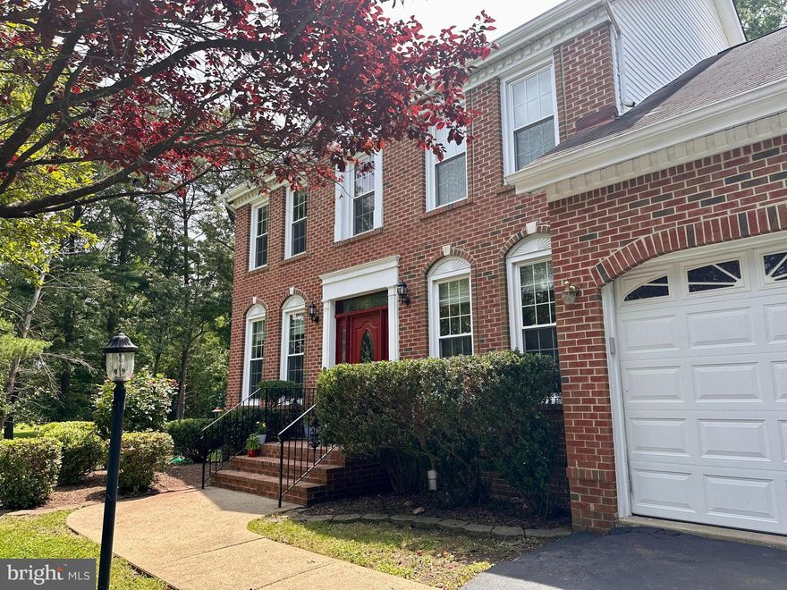 NEW PRICE!  A gem on a cul-de-sac with lots of space and 2 home offices.  Some other features are an open floor plan, 2-story foyer, gourmet kitchen with granite counter tops, island & stainless steel appliances including a brand new refrigerator with french doors and bottom freezer. Private home office on main level with glass french doors. Elegant living room with glass french doors leading to dining room. 

Upstairs you will enjoy its Spacious Owner's Suite with private sitting room, and a large walking closet, not to be confused with additional bedroom! There are 2 additional bedrooms a guest bathroom on this level.

The lower level is a full daylight basement compelely finished.  Here you will find a rec room, another room with a closet ideal for hobbies. There is also a spacious 4th bedroom and a full bathroom and a 2nd home office that could also be a 5th bedroom with its own exterior entrance. 

This home also offers beautiful wood floors on the main level and laminate and ceramic floors in upper and lower levels. 

The exterior features are equally impressive and ideal for entertaining of just enjoy been outside.  Large  custom deck off the family room with a gazebo and stairs to the patio below.  Custom play house could be a great shed as well.  Large side yard facing mature trees.  The house is the last house on the street and at the entrance of the cul de sac. 

Finished 2-car garage and just in case, a whole-house, built -in, industrial power generator. Walking distance to Metro, schools & Springfield Town Center. Close to commuter lot, 95,395 & 495, TSA HQ. Easy commute to National Landing (former Crystal City and new Amazon home), National airport, Ft. Belvoir, Pentagon, Tysons & DC.